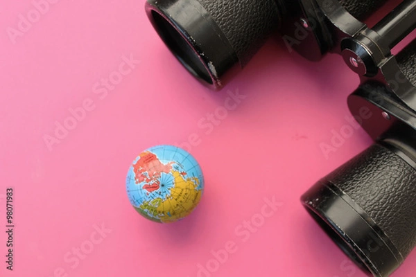 Obraz Binoculars and globe