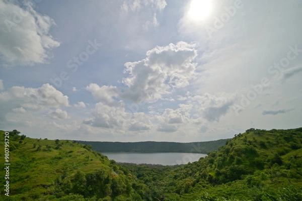 Obraz Faraway view of Lonar crater lake under cloudy skies, Maharashtra, India.
