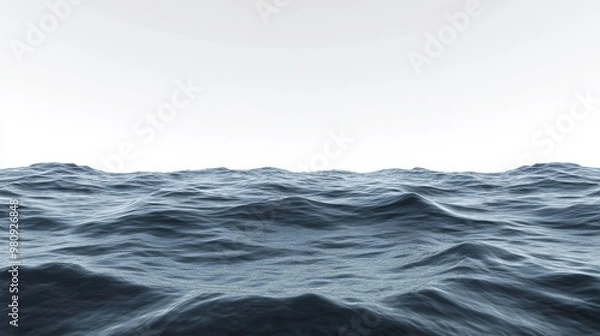 Fototapeta Calm ocean waves under a clear sky, creating a peaceful and serene seascape.