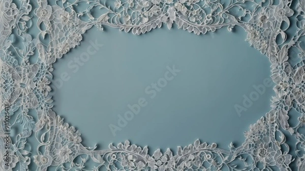 Obraz An intricate lace frame with floral patterns on a soft blue background. The white lace adds an elegant touch, perfect for invitations, announcements, or decorative designs.