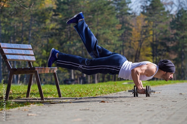 Obraz one leg push ups in nature