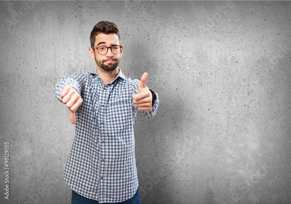 Obraz man doing a contradictory gesture