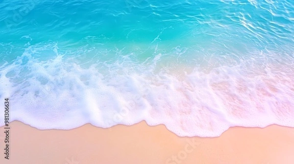 Fototapeta Gentle waves wash over a sandy beach with clear turquoise water and soft foam, perfect for showcasing themes of relaxation, summer vacations, tropical destinations, and serene landscapes,