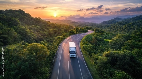 Obraz Truck on a Winding Road at Sunset