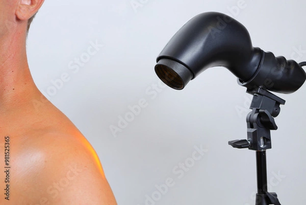 Fototapeta Therapeutic lamp for light rehabilitation, improving the condition of inflamed joints and more