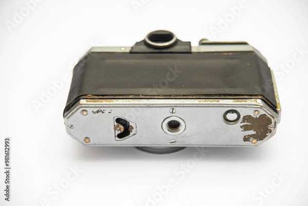 Obraz Poorly treated photo camera destroyed by time damaged broken