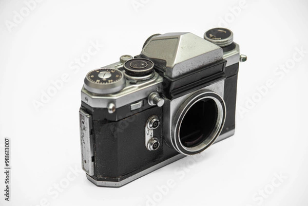 Fototapeta Poorly treated photo camera destroyed by time damaged broken