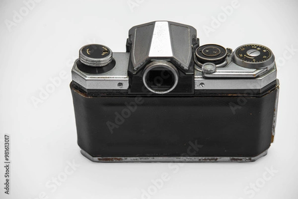 Fototapeta Poorly treated photo camera destroyed by time damaged broken