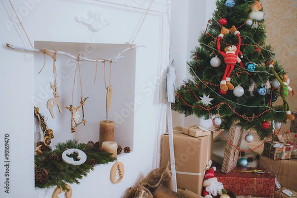 Obraz Christmas tree, presents and fireplace