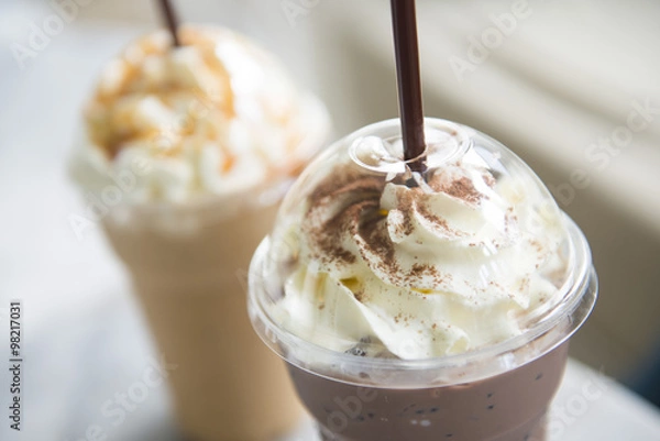 Obraz ice chocolate and caramel frappe in the takeaway plastic cup