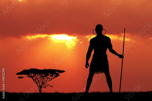 Fototapeta Indigenous man at sunset