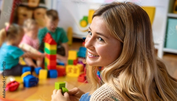 Obraz Kindergärtnerin im Kindergarten