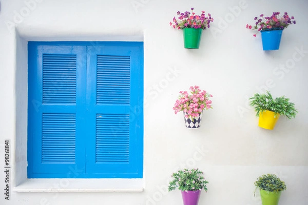 Obraz Colorful flower pots on the wall