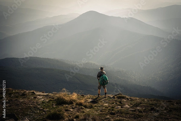 Fototapeta Above the Clouds: A Moment of Triumph