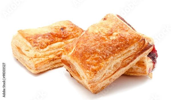 Fototapeta Fresh puff pastries with cherry jam isolated
