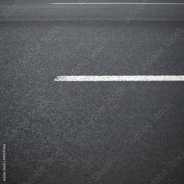 Fototapeta Asphalt surface of the road