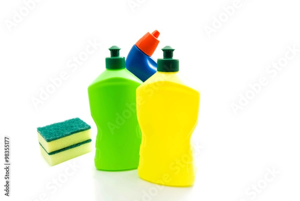 Fototapeta bottles of detergent and sponges on white