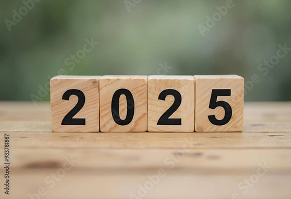 Fototapeta 2025 wooden block numbers represent growth and change in business. This image captures essence of planning for future and embracing new opportunities