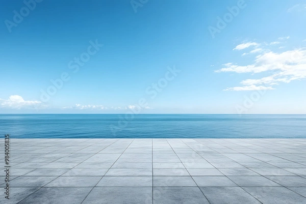 Fototapeta Blue sky with empty concrete floor and sea view. Vibrant banner with space for copy. Horizontal image of a calm ocean and clear sky. Ideal for promotional use