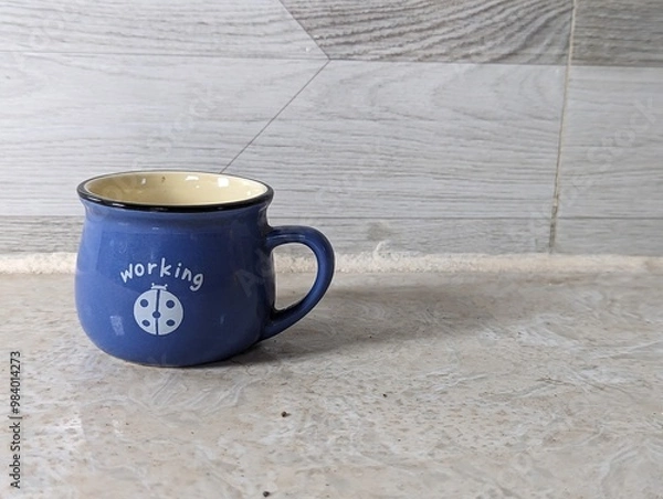 Obraz Blue work text cup isolated on white background