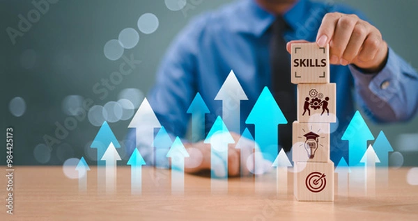 Obraz Skill competency development concept. Up new ability skill training for technology evolution. Leadership thinking upskill. Hand hold wooden cube, soft skill digital icon. Education learning talent
