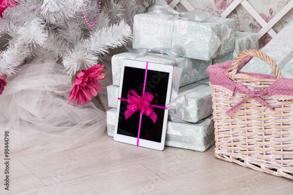 Obraz Tablet computer with gift ribbon