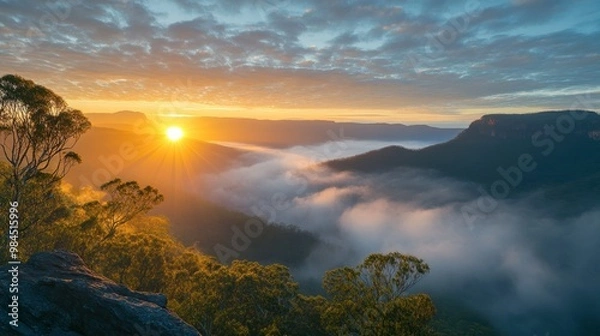 Fototapeta Sunrise over Ackmon National Park, with the first rays of light illuminating the park's vast landscape and misty valleys.