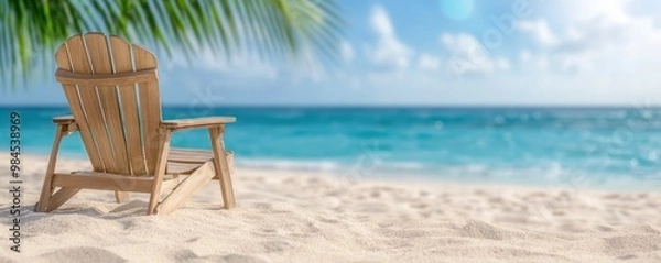 Obraz Beach chairs on sandy beach with palm tree and turquoise sea. Summer vacation and travel concept
