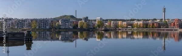 Obraz Panorama view, the district Hammarby sjöstad, boats, the district Södermalm, piers, boats, commuting ferries and apartment houses, a sunny summer day in Stockholm