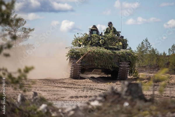 Fototapeta Danish infantry fighting vehicle ( CV90) during exercise Arrow in Finland, Combat Vehicle 90 is a family of Swedish tracked combat vehicles designed by Hägglunds and Bofors
