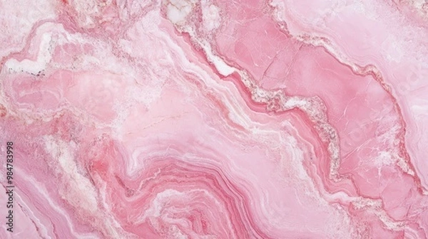 Fototapeta A stunning pink marble surface featuring delicate swirls and varying shades of pink, creating a romantic and elegant backdrop.