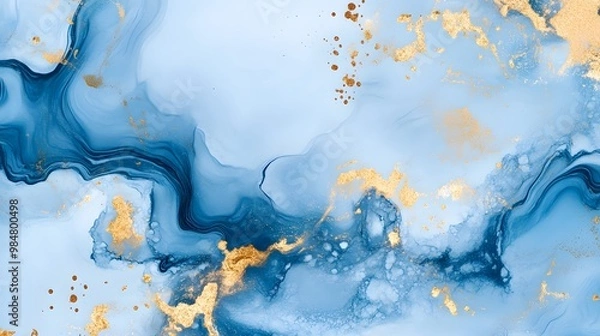 Fototapeta Abstract blue and gold marble background, liquid watercolor effect, soft flowing textures with splashes of metallic silver glitter on a dark gray backdrop.