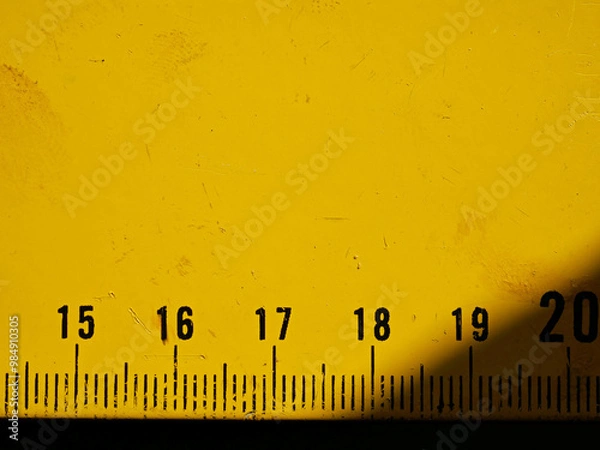 Fototapeta Close-up detail of yellow measuring ruler