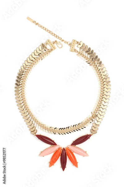 Fototapeta gold necklace with gems isolated on white