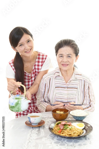 Fototapeta 食事を楽しむ年配者