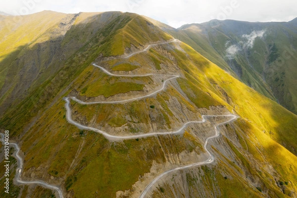 Fototapeta Aerial view of mountain winding road in Tusheti, Georgia. Abano pass. One of the most dangerous road on the world. High quality photo