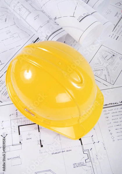 Fototapeta Building plans and yellow hardhat