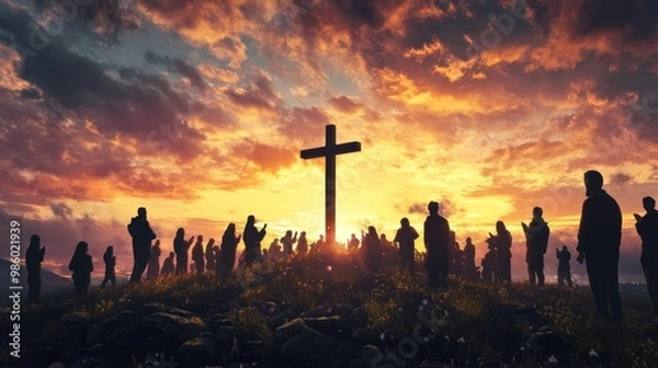 Fototapeta Worshippers gathered around a cross, singing songs of praise to Jesus Christ under an evening sky,