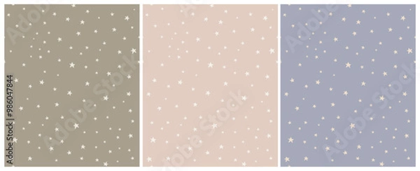 Obraz Tiny Stars Seamless Vector Patterns.Irregular Hand Drawn Simple Starry Print for Fabric,Textile,Wrapping Paper. Infantile Style Galaxy Design.Little Stars Isolated on a Green, Blue and Light Pink.