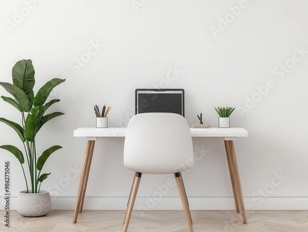Fototapeta Minimalist home office with uncluttered desk and simple shelving, minimalistic interior, focused workspace