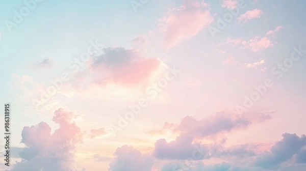 Obraz Serene morning sky with pastel tones of pink and blue as the sun rises