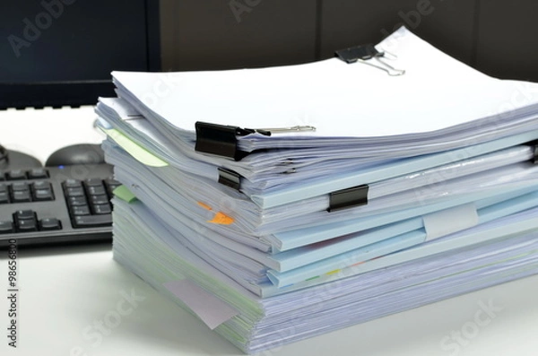 Fototapeta Documents on desk at workplace