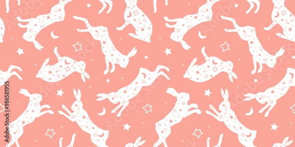 Fototapeta Seamless pattern with silhouettes of hares on a background of stars. Vector graphics.