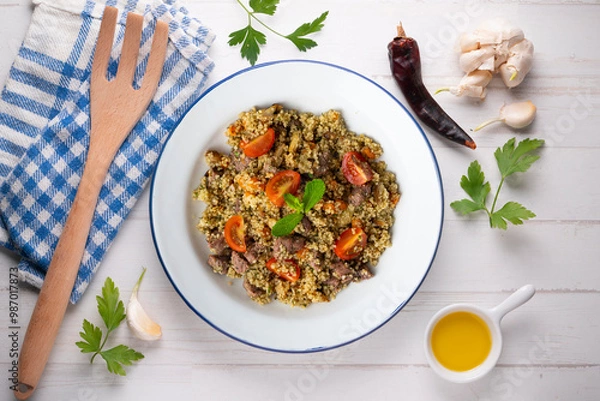 Fototapeta Couscous with beef and vegetables. Top view table with  decoration.