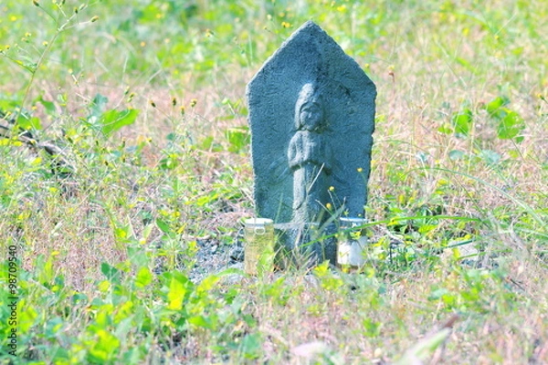 Fototapeta 道端の石像