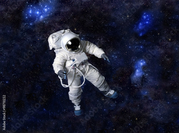 Obraz Astronaut floating in dark space.