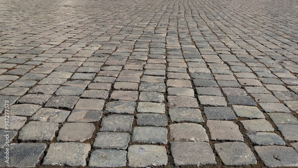 Fototapeta Sampietrini. Paving of ancient Roman roads. The cobblestones in Piazza del Campidoglio.