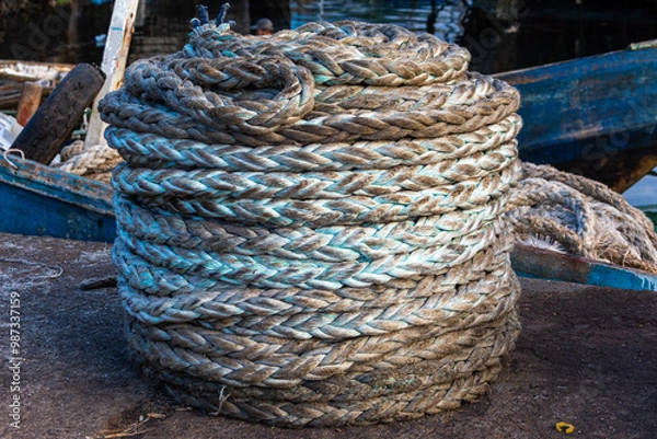Fototapeta The function of Ship Rope is to tie up a ship to a mooring at jetty.
