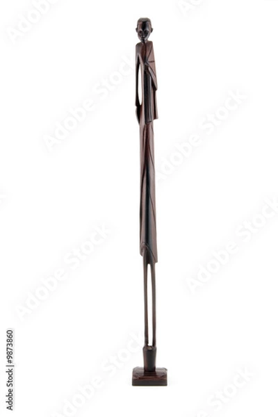 Fototapeta high wood handmade african statue cut out of white background