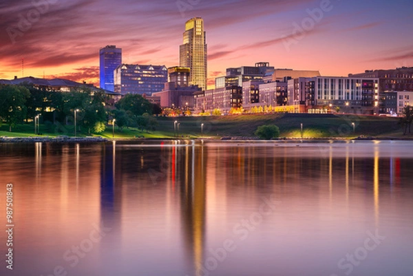 Obraz Omaha, Nebraska, USA. Cityscape image of downtown Omaha, Nebraska with reflection of the skyline at beautiful autumn sunset.